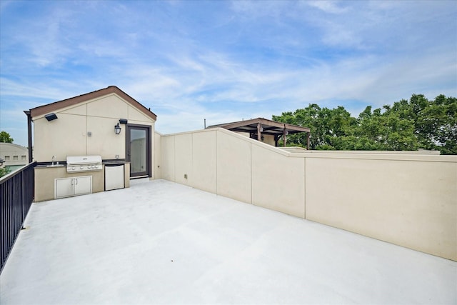 5411 Gibson St, Houston, TX 77007 - view of patio with an outdoor kitchen