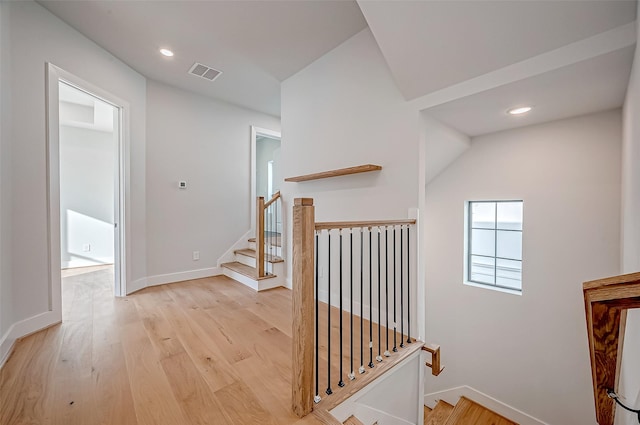 1222 W 24th St Unit E, Houston, TX 77008 - corridor featuring light wood-style floors, recessed lighting, and stairway