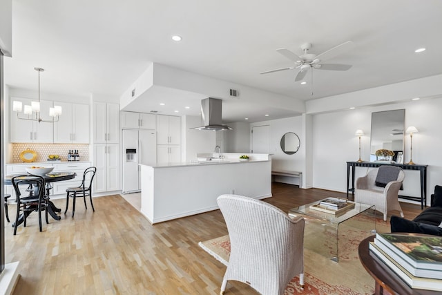 2001 Holcombe Blvd Unit 2305, Houston, TX 77030 - living area with light wood-style floors, ceiling fan, a chandelier, and recessed lighting