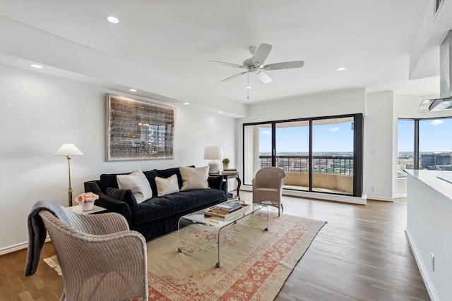 2001 Holcombe Blvd Unit 2305, Houston, TX 77030 - living area with wood finished floors, ceiling fan, and recessed lighting