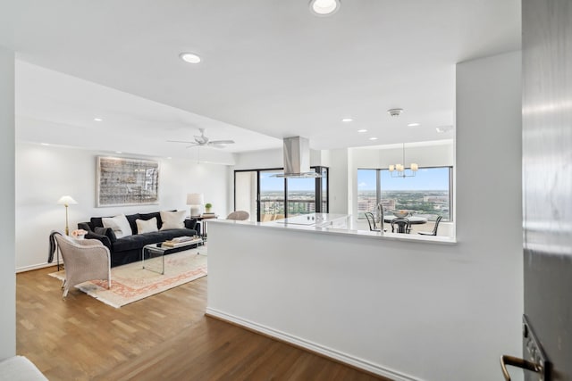 2001 Holcombe Blvd Unit 2305, Houston, TX 77030 - living area with wood finished floors, recessed lighting, and ceiling fan