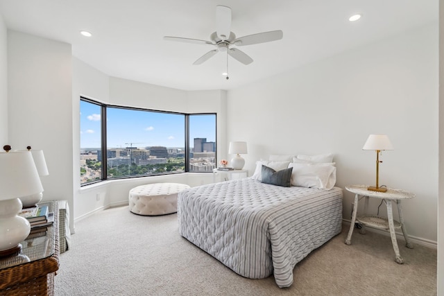 2001 Holcombe Blvd Unit 2305, Houston, TX 77030 - carpeted bedroom featuring recessed lighting, ceiling fan, and a city view
