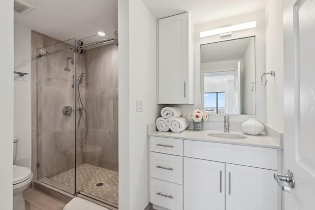 2001 Holcombe Blvd Unit 2305, Houston, TX 77030 - full bathroom featuring a shower stall and vanity
