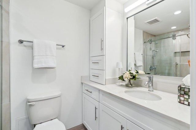 2001 Holcombe Blvd Unit 2305, Houston, TX 77030 - full bathroom with vanity, a shower with door, and recessed lighting