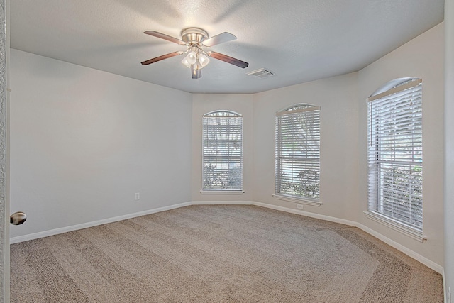 9614 Summer Laurel Ln, Houston, TX 77088 - carpeted spare room featuring ceiling fan and a textured ceiling