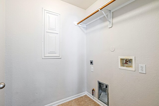 9614 Summer Laurel Ln, Houston, TX 77088 - washroom with hookup for a gas dryer, washer hookup, tile patterned floors, and electric dryer hookup