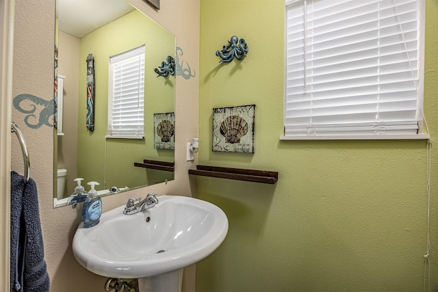 1315 40th St, Rear, Galveston, TX 77550 - bathroom featuring a sink and toilet