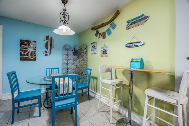 1315 40th St, Rear, Galveston, TX 77550 - tiled dining space featuring baseboards