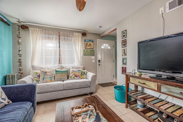 1315 40th St, Rear, Galveston, TX 77550 - living room with light tile patterned floors