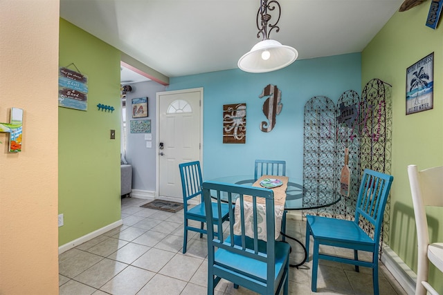 1315 40th St, Rear, Galveston, TX 77550 - dining space featuring light tile patterned floors and baseboards