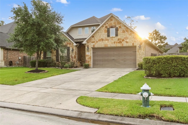 31428 Longwood Park Ln, Spring, TX 77386 - view of front of home featuring stone siding, a front lawn, and driveway