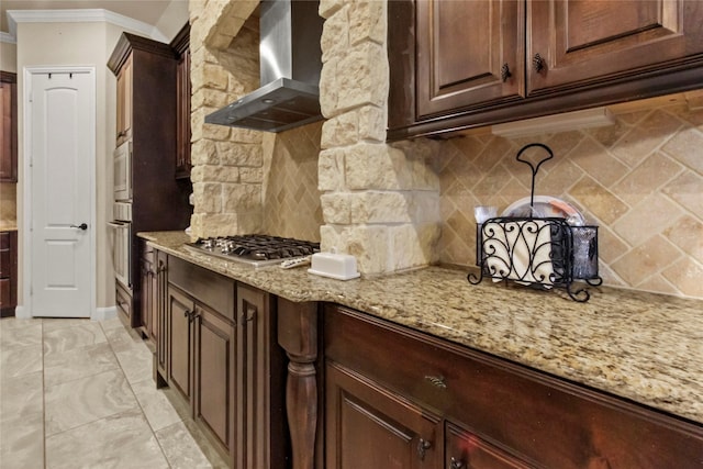 31428 Longwood Park Ln, Spring, TX 77386 - kitchen with wall chimney exhaust hood, crown molding, stainless steel appliances, light stone countertops, and tasteful backsplash