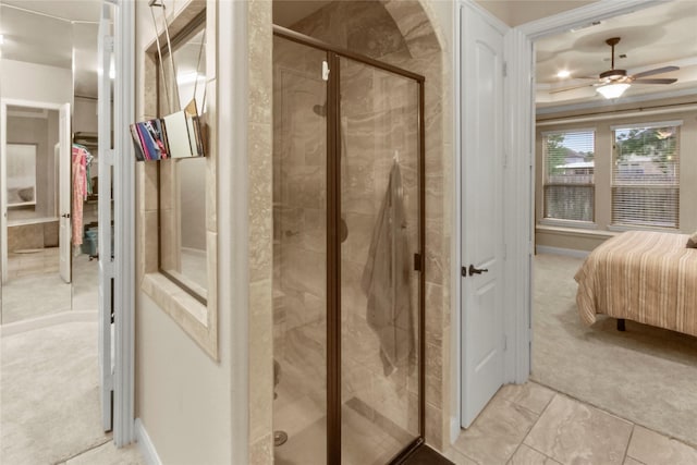 31428 Longwood Park Ln, Spring, TX 77386 - ensuite bathroom featuring a shower stall, a ceiling fan, and a closet