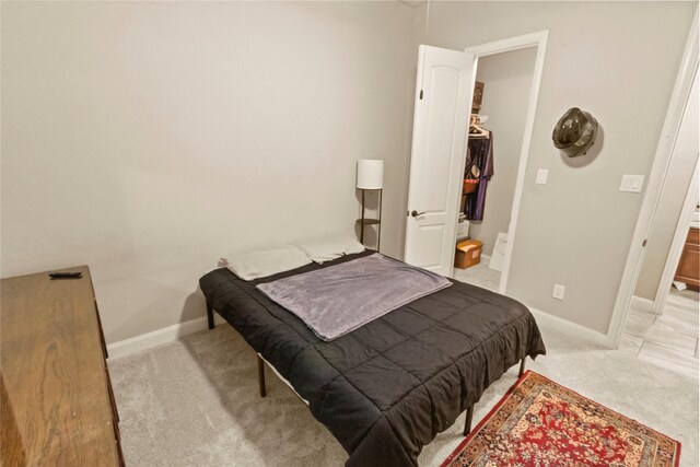 31428 Longwood Park Ln, Spring, TX 77386 - bedroom with carpet and baseboards