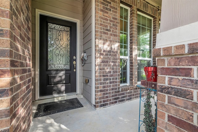 23823 Pennington Hills Dr, Spring, TX 77389 - entrance to property featuring brick siding and a porch