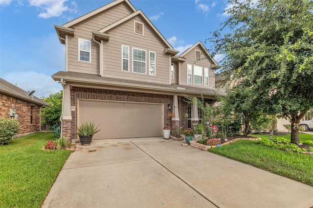 23823 Pennington Hills Dr, Spring, TX 77389 - view of front of home featuring brick siding, an attached garage, a front lawn, and driveway