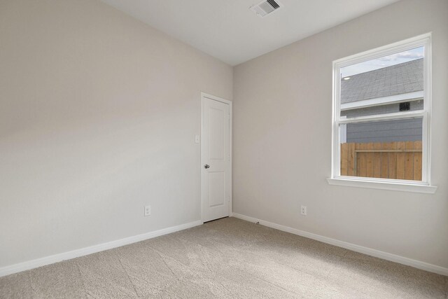 16434 Blossom Grove Dr, Conroe, TX 77303 - empty room featuring light colored carpet and baseboards