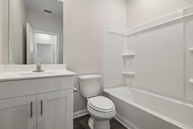 16434 Blossom Grove Dr, Conroe, TX 77303 - bathroom featuring vanity, wood finished floors, and shower / washtub combination