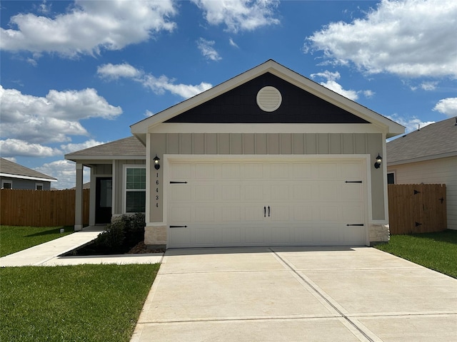 16434 Blossom Grove Dr, Conroe, TX 77303 - single story home with driveway and an attached garage