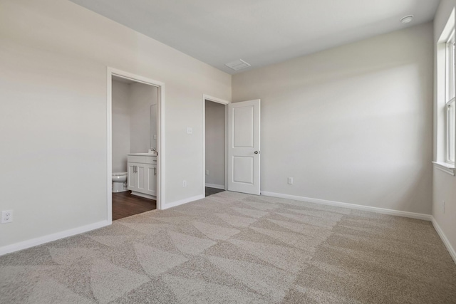 16434 Blossom Grove Dr, Conroe, TX 77303 - unfurnished bedroom featuring carpet flooring and ensuite bath