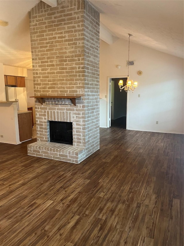 4822 Misty Shadows Dr, Houston, TX 77041 - unfurnished living room with dark wood finished floors, a chandelier, a brick fireplace, beam ceiling, and high vaulted ceiling