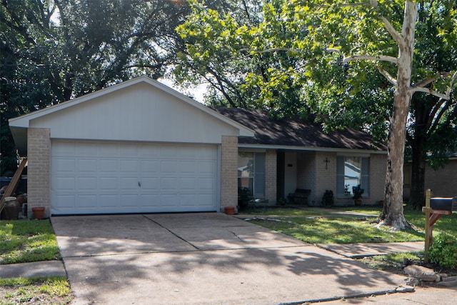 4822 Misty Shadows Dr, Houston, TX 77041 - single story home featuring brick siding, driveway, a garage, and a front lawn