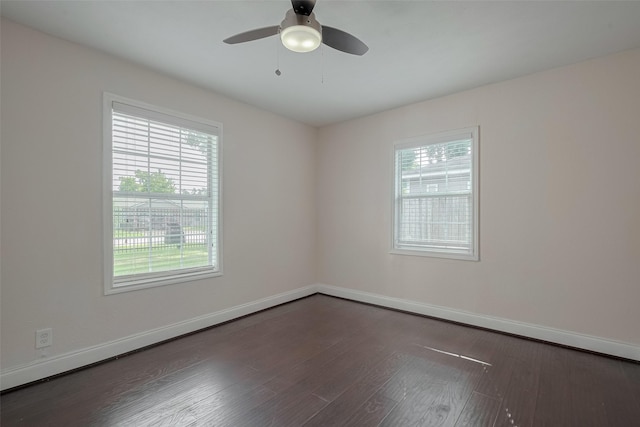 3930 Daphne St, Houston, TX 77021 - spare room featuring plenty of natural light, a ceiling fan, and dark wood finished floors
