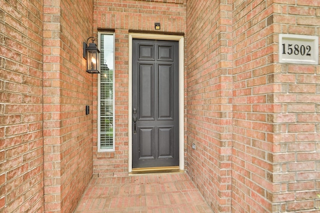 15802 Aberdeen Trails Dr, Houston, TX 77095 - doorway to property featuring brick siding