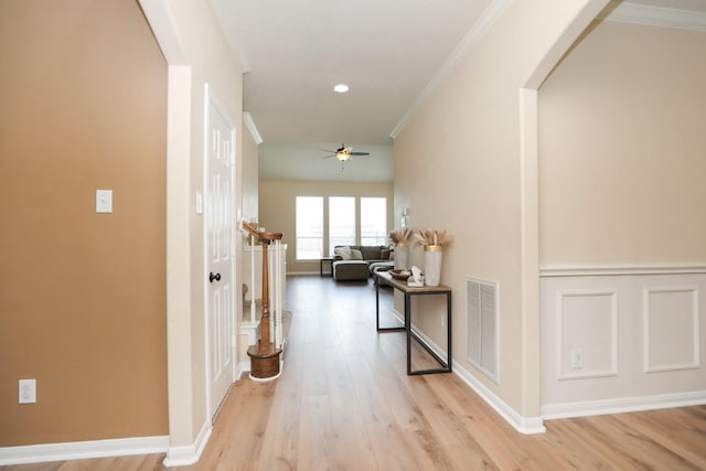 15802 Aberdeen Trails Dr, Houston, TX 77095 - hallway featuring arched walkways, light wood-type flooring, crown molding, and recessed lighting