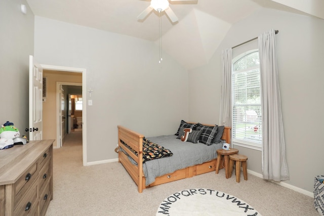 15802 Aberdeen Trails Dr, Houston, TX 77095 - bedroom featuring light carpet, multiple windows, vaulted ceiling, and a ceiling fan