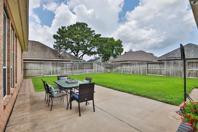 15802 Aberdeen Trails Dr, Houston, TX 77095 - fenced backyard with a patio area and outdoor dining area