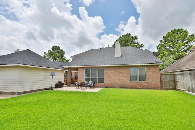 15802 Aberdeen Trails Dr, Houston, TX 77095 - back of property with a patio area, a chimney, and brick siding