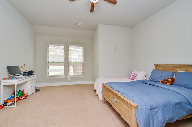 27522 Blackstone Canyon Ln, Katy, TX 77494 - bedroom with light colored carpet and a ceiling fan