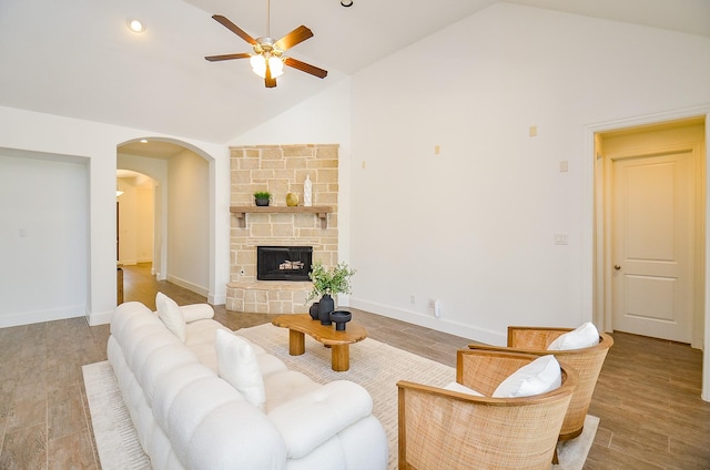 27522 Blackstone Canyon Ln, Katy, TX 77494 - living room with ceiling fan, arched walkways, high vaulted ceiling, recessed lighting, and wood finished floors