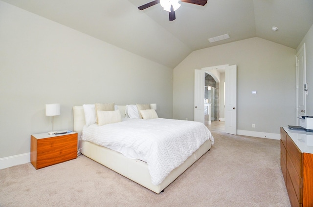 27522 Blackstone Canyon Ln, Katy, TX 77494 - bedroom with light carpet, vaulted ceiling, ensuite bath, and ceiling fan