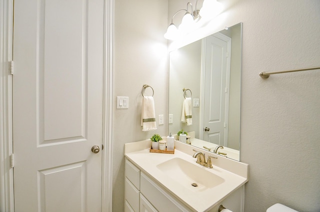 27522 Blackstone Canyon Ln, Katy, TX 77494 - half bath featuring vanity and a textured wall