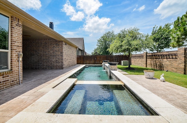27522 Blackstone Canyon Ln, Katy, TX 77494 - view of swimming pool featuring a patio area, a fenced backyard, and an in-ground hot tub