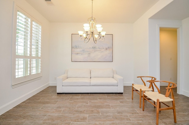 27522 Blackstone Canyon Ln, Katy, TX 77494 - living area with a chandelier, plenty of natural light, and light wood finished floors