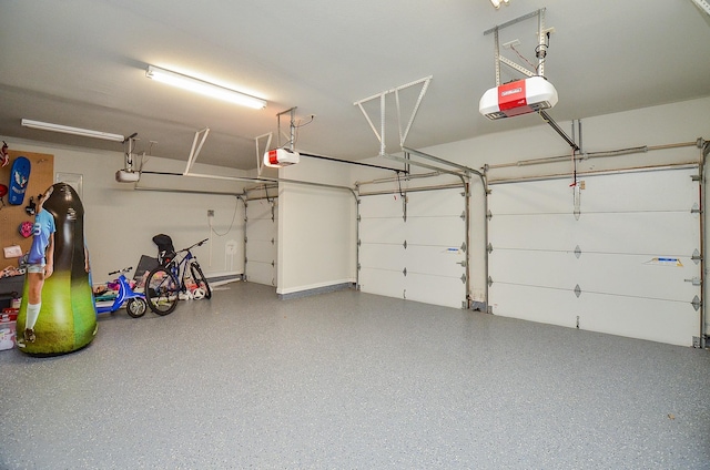27522 Blackstone Canyon Ln, Katy, TX 77494 - garage featuring a garage door opener