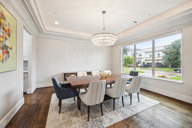 8304 Maple Ct, Bellaire, TX 77401 - dining area with a chandelier, wood finished floors, ornamental molding, recessed lighting, and a tray ceiling