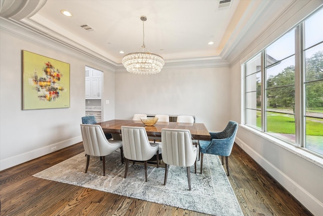 8304 Maple Ct, Bellaire, TX 77401 - dining area with a chandelier, crown molding, dark wood-style floors, a tray ceiling, and recessed lighting