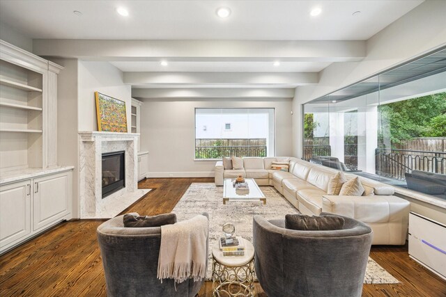 8304 Maple Ct, Bellaire, TX 77401 - living area featuring a fireplace, recessed lighting, and dark wood-style floors