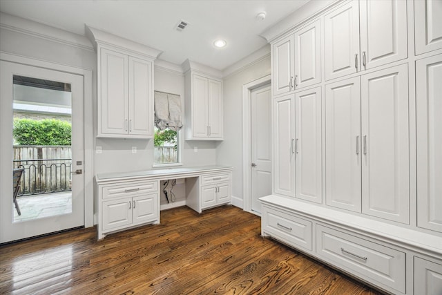 8304 Maple Ct, Bellaire, TX 77401 - mudroom with built in study area, dark wood-style floors, recessed lighting, and ornamental molding