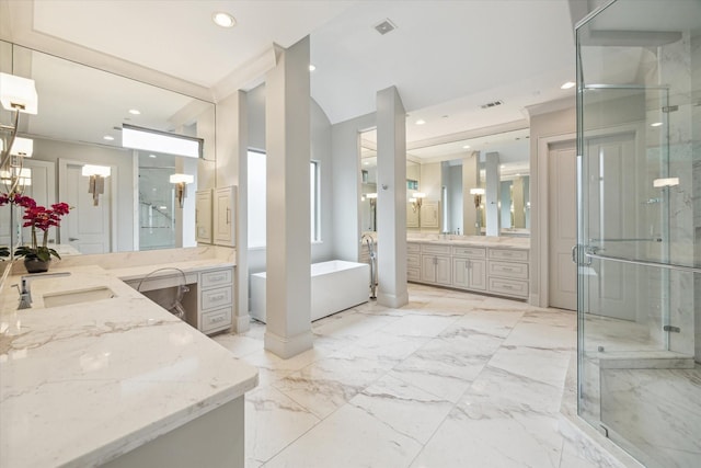 8304 Maple Ct, Bellaire, TX 77401 - full bathroom with recessed lighting, two vanities, a soaking tub, a marble finish shower, and marble tiled flooring