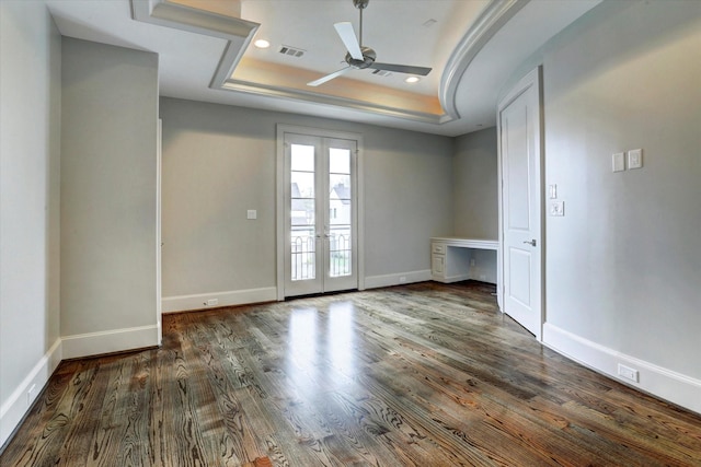 8304 Maple Ct, Bellaire, TX 77401 - spare room featuring a ceiling fan, a tray ceiling, wood finished floors, french doors, and recessed lighting
