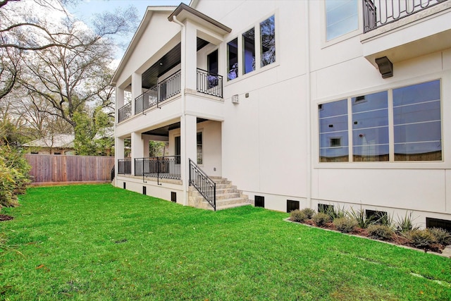 8304 Maple Ct, Bellaire, TX 77401 - view of property exterior with a balcony and stucco siding