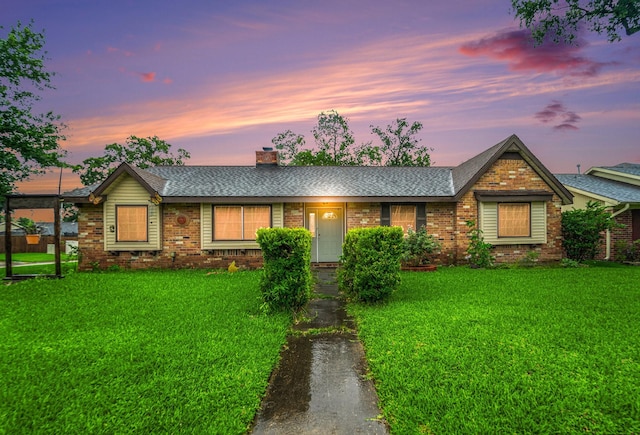 14030 Duncannon Dr, Houston, TX 77015 - single story home featuring brick siding, a front yard, roof with shingles, and a chimney