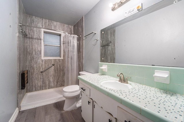 14030 Duncannon Dr, Houston, TX 77015 - full bathroom with vanity, tiled shower, and wood finished floors