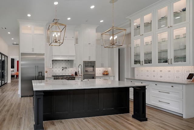 27003 Hidden Grove Landing Dr, Spring, TX 77386 - kitchen featuring a chandelier, appliances with stainless steel finishes, decorative backsplash, white cabinets, and recessed lighting