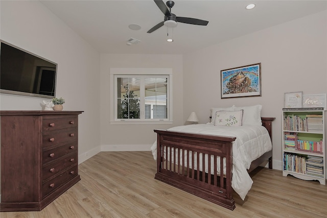 27003 Hidden Grove Landing Dr, Spring, TX 77386 - bedroom with light wood-type flooring, a ceiling fan, and recessed lighting